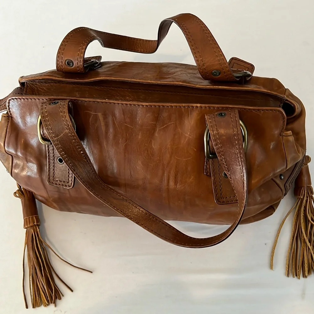 Capacciou large brown Leather bag  side zip pockets 2  long leather tassels